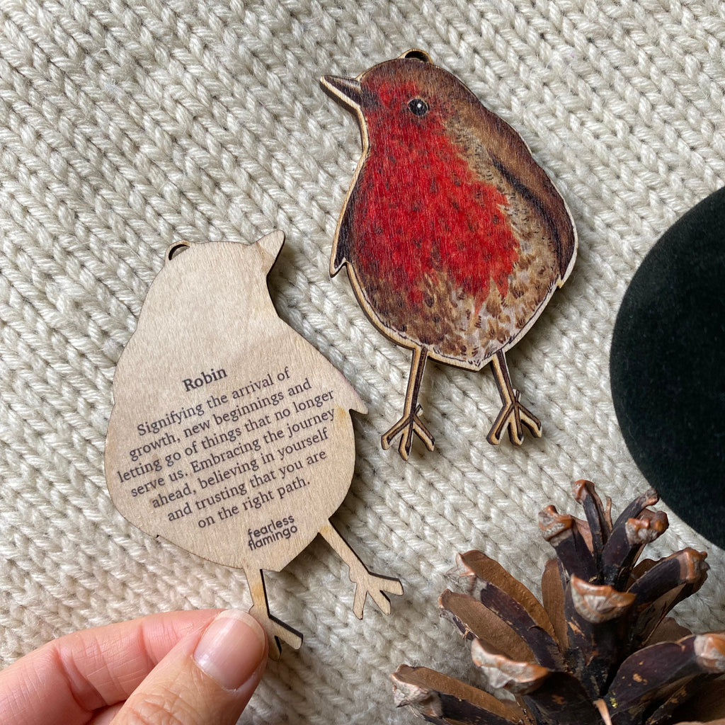 Robin bird wooden decoration with the symbolic meaning on the back