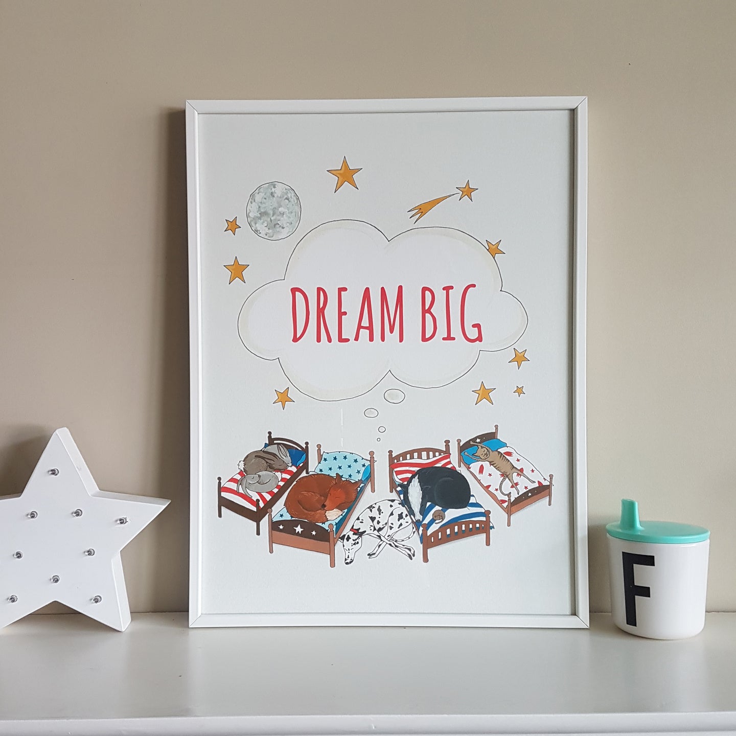Charming hand illustrated Dream Big animal print for the nursery